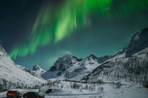 Breathtaking Illumination of Aurora Borealis in Mountains of Northern Norway